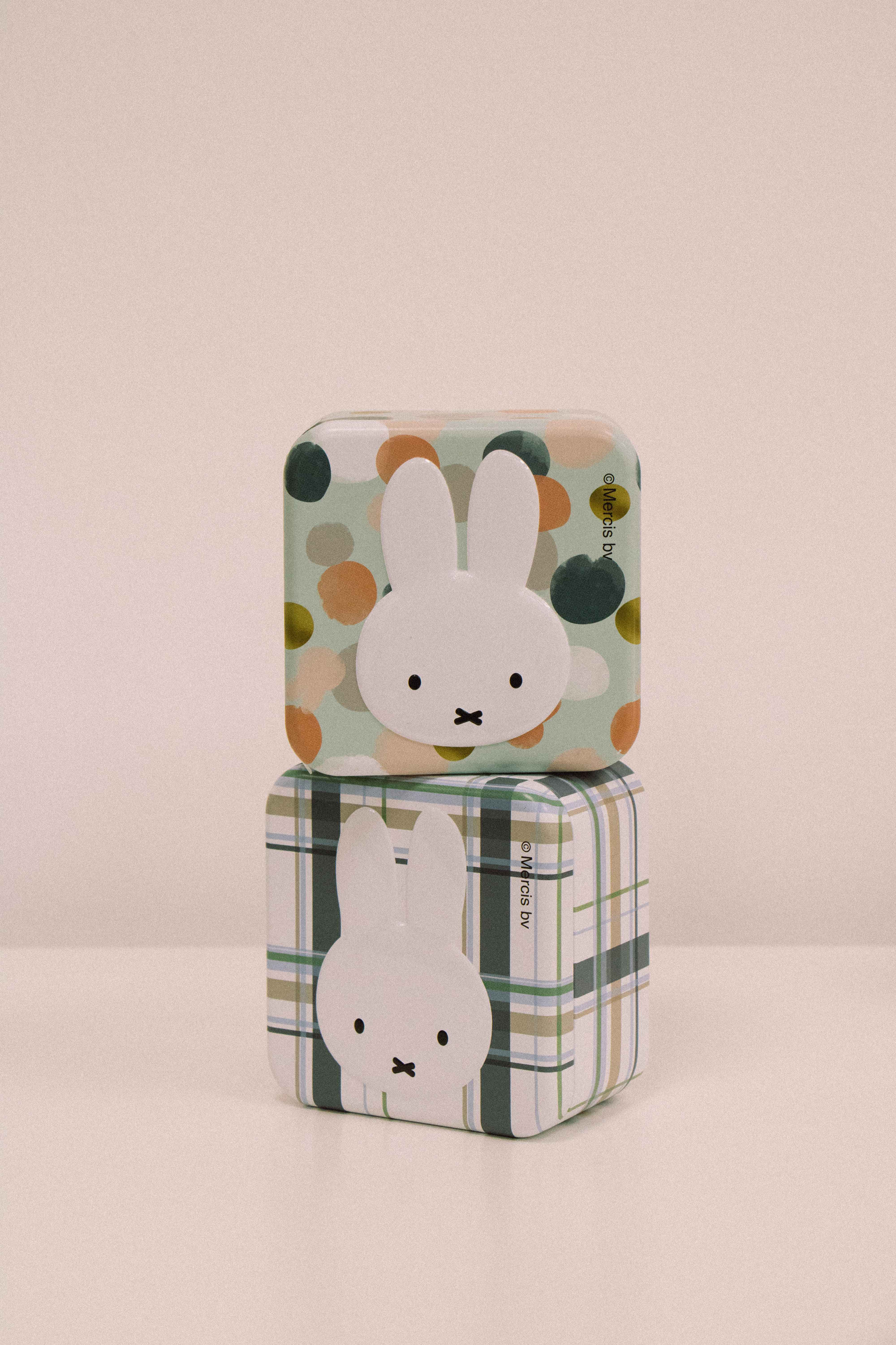 Miffy Pocket Cable retractable USB-C charging cable packaging featuring iconic Miffy character artwork in plaid and polka dot designs