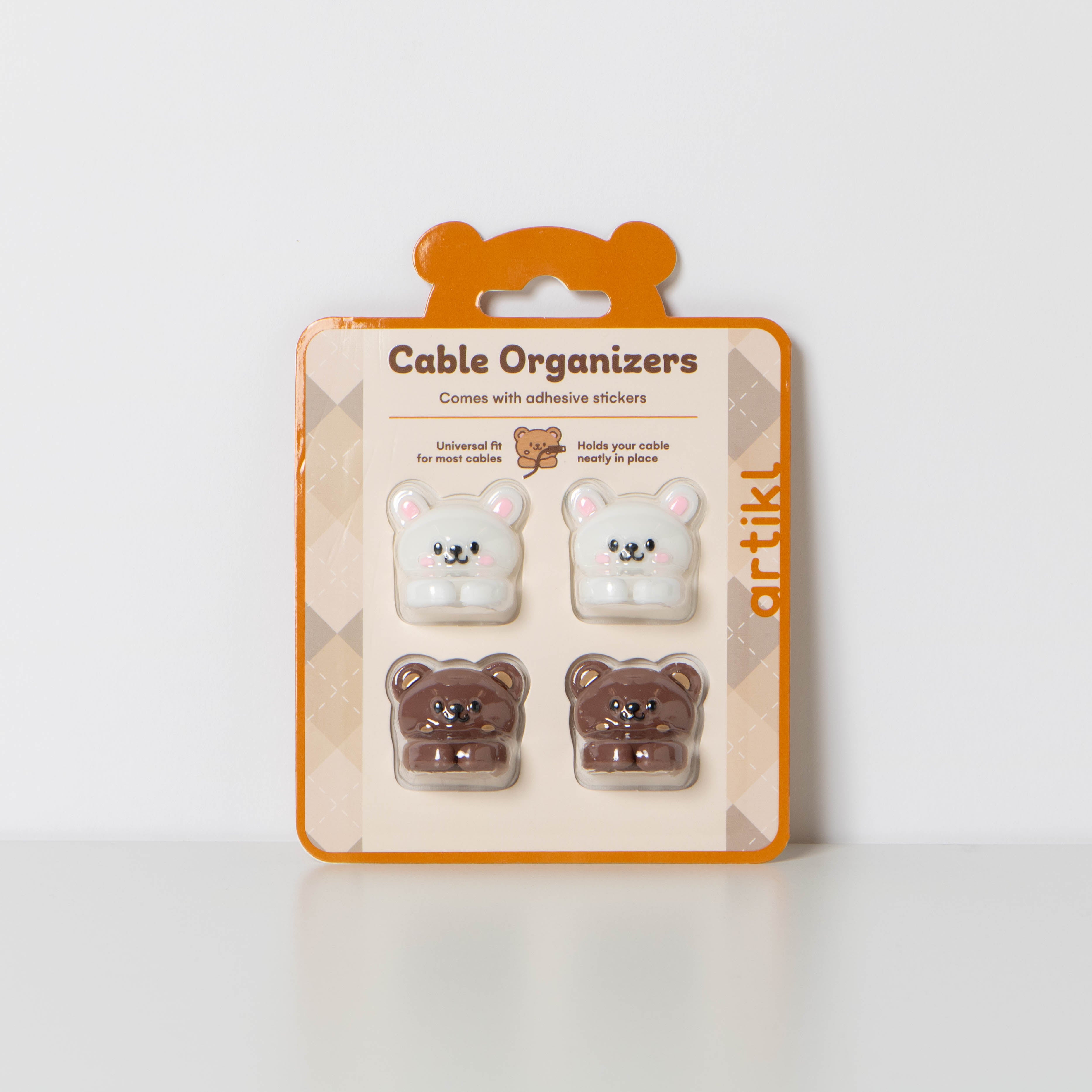 Bunny & Bear Cable Organizers packaging featuring bunny and bear clip set with adhesive stickers and universal fit for most cables