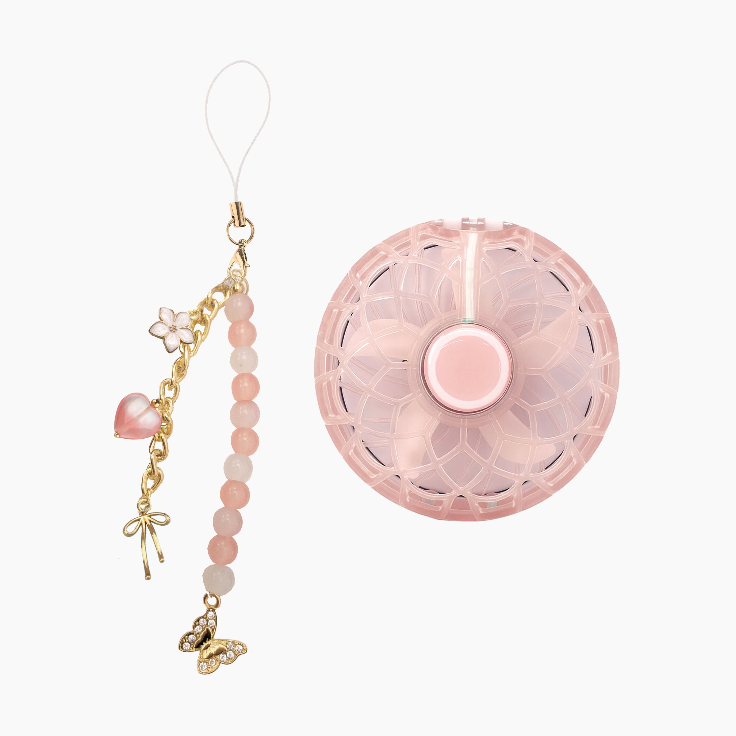 Foldable Dual Mirror Handheld Fan package contents featuring the pink fan and mirror unit with a beaded charm strap featuring pearl, flower, and butterfly accents