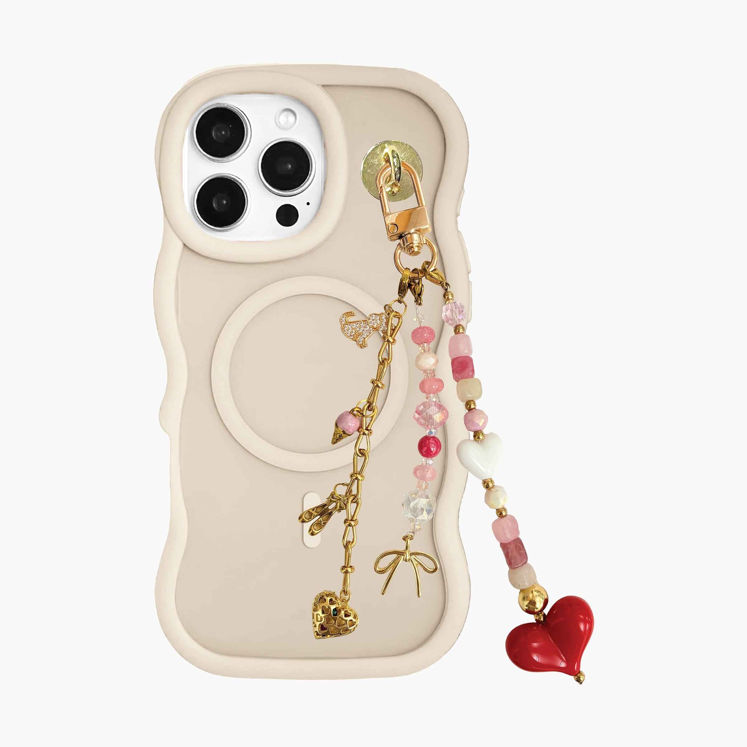 Heart-themed beaded phone charm attached to MagSafe phone case featuring pink gemstone beads, crystal accents, gold-tone details, and red heart pendant