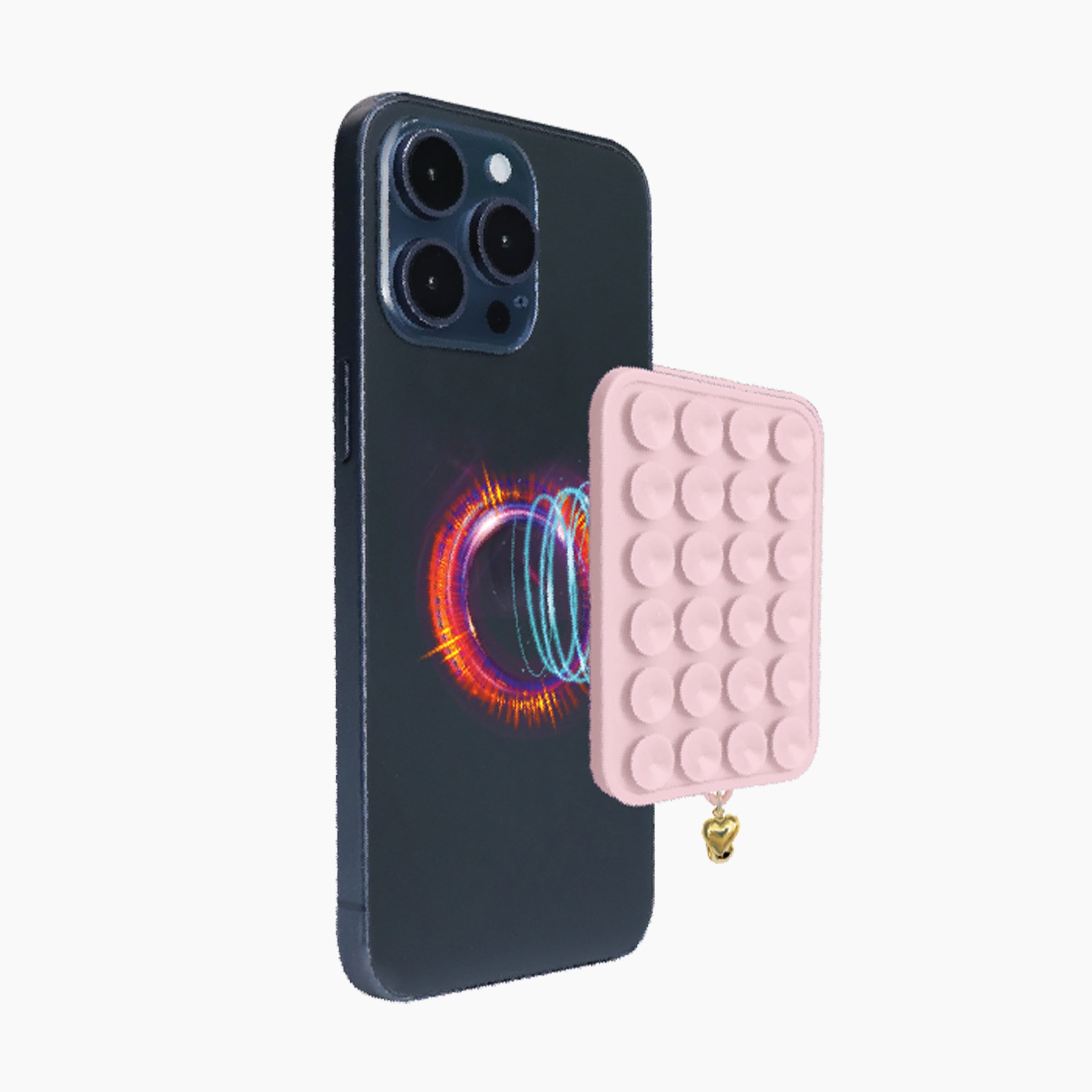 Artikl Snug Magnetic Phone Grip with Gold Heart Charm in Blush Pink, detaching from phone demonstrating strong magnetic connection