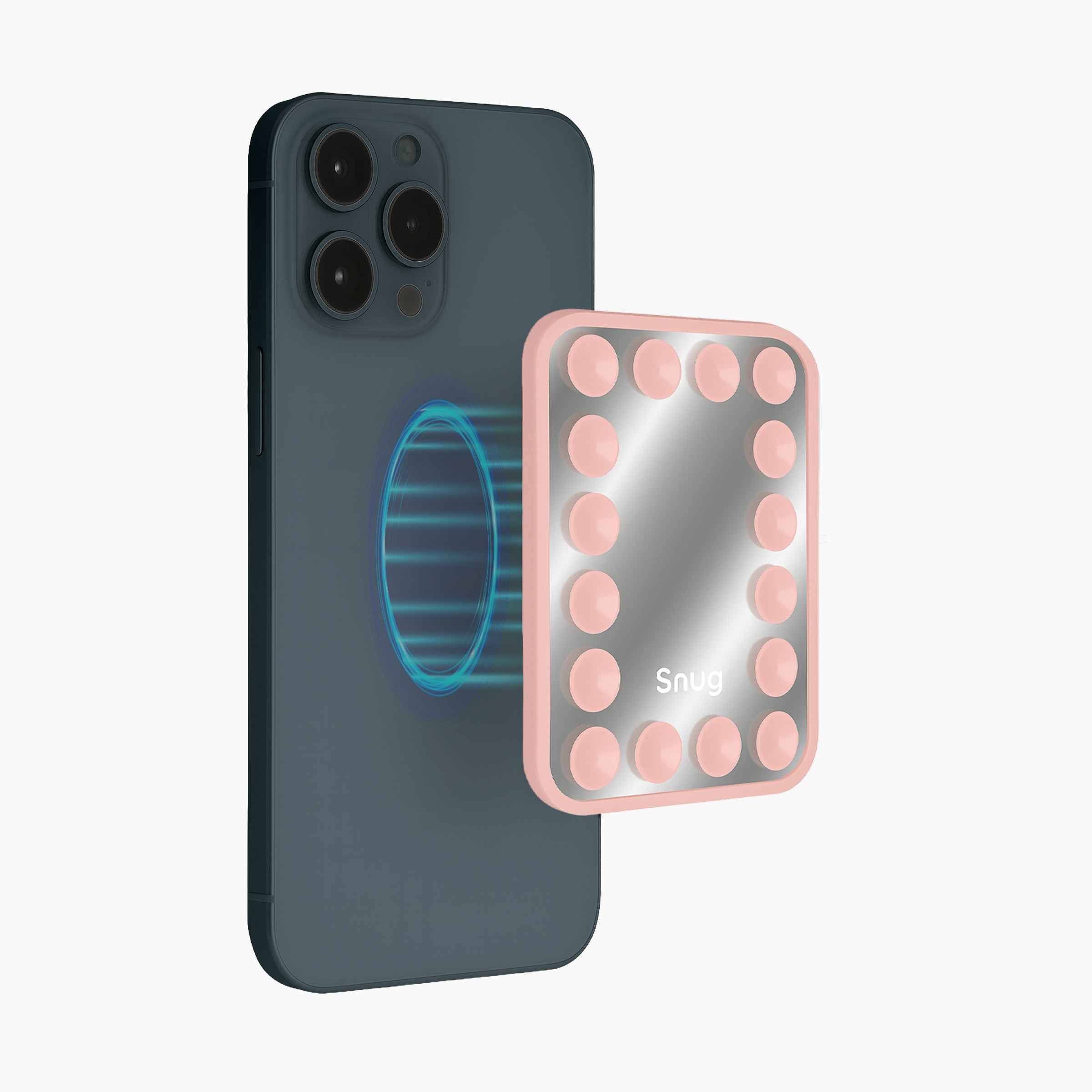 Snug MagSafe compatible suction phone mount with built-in mirror, pink suction cups, and multi-surface mounting design attached to smartphone