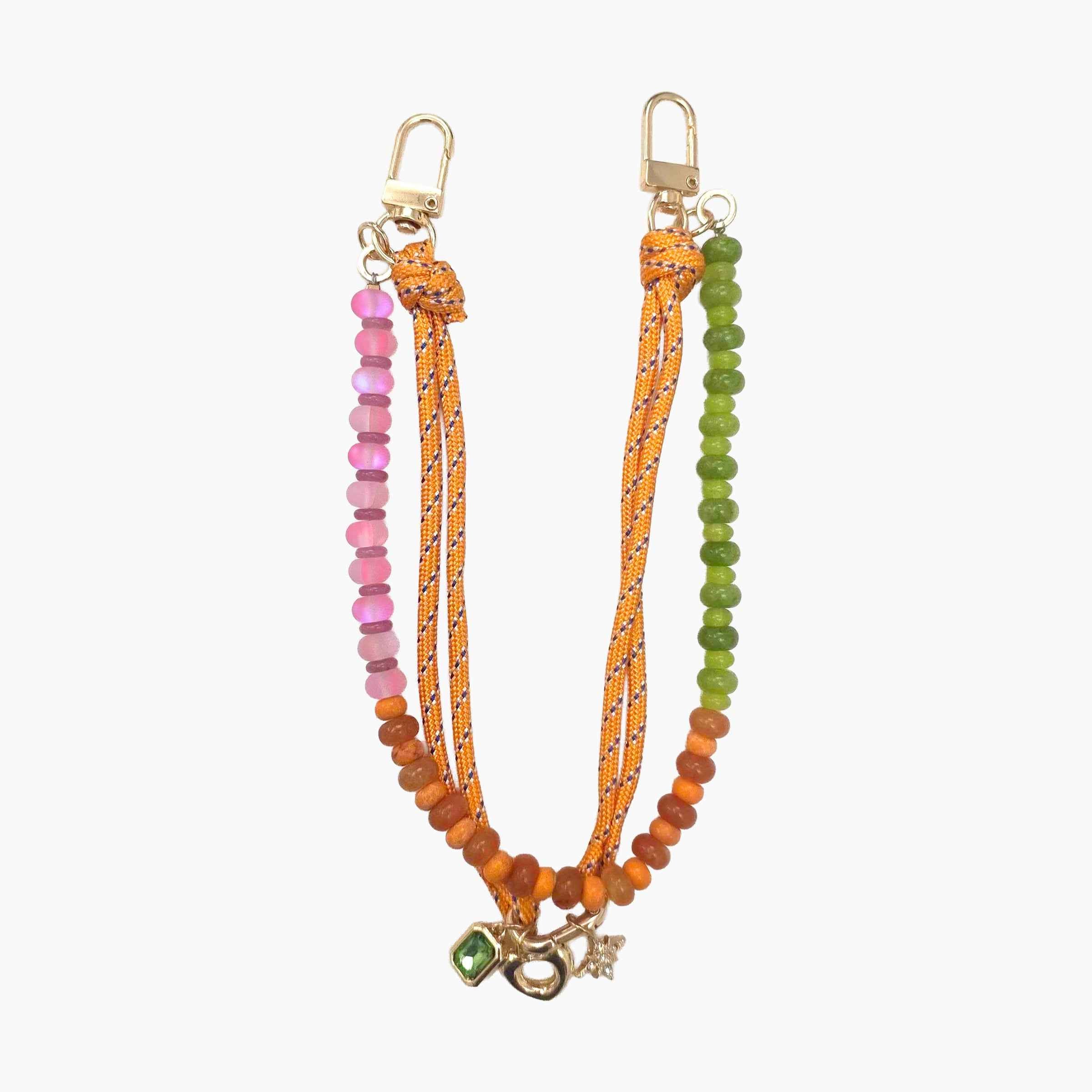 Colorful beaded phone wristlet strap featuring gemstone-style beads, braided rope details, and decorative charms for phones, keys, and bags