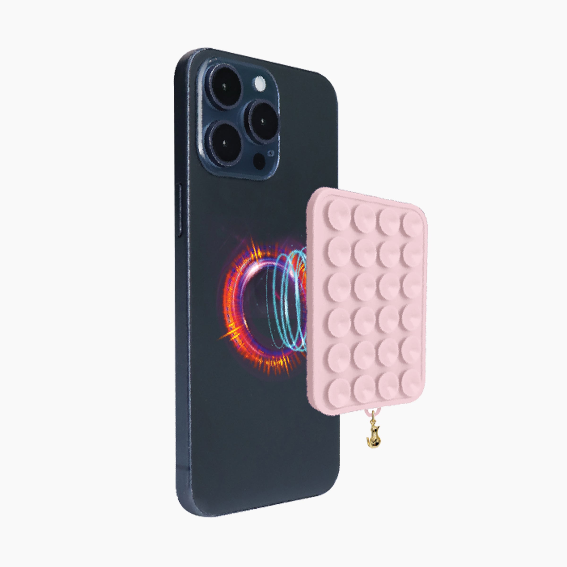 Artikl Snug Magnetic Phone Grip with Cat Charm in Blush Pink, detaching from phone demonstrating strong magnetic connection