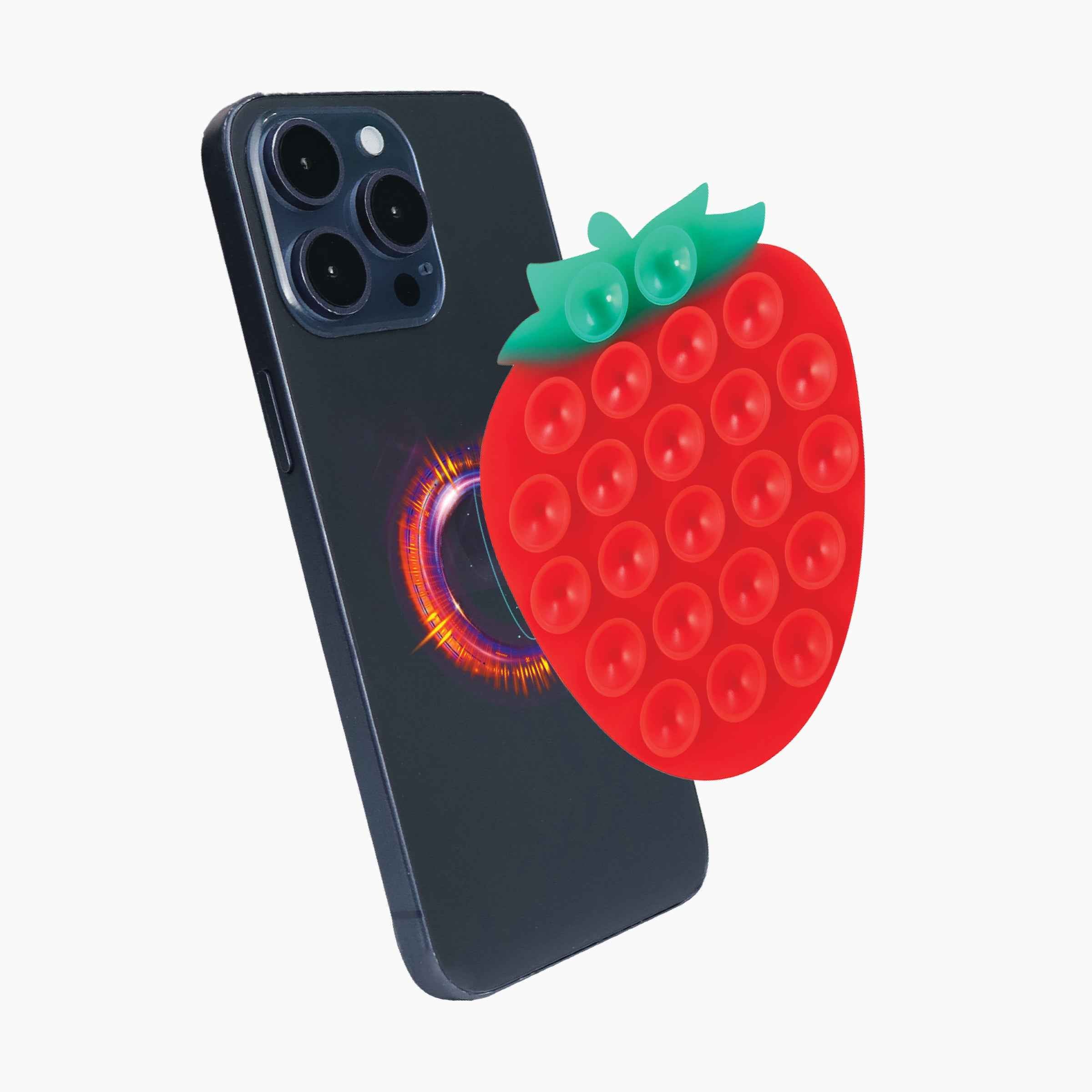 Strawberry-shaped suction phone mount attached to smartphone with strong suction cup design and MagSafe compatibility
