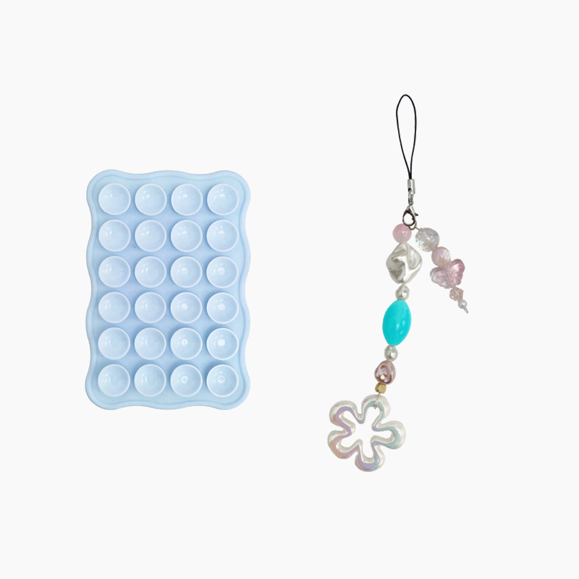 Blue suction phone grip pad with pastel beaded flower phone charm strap