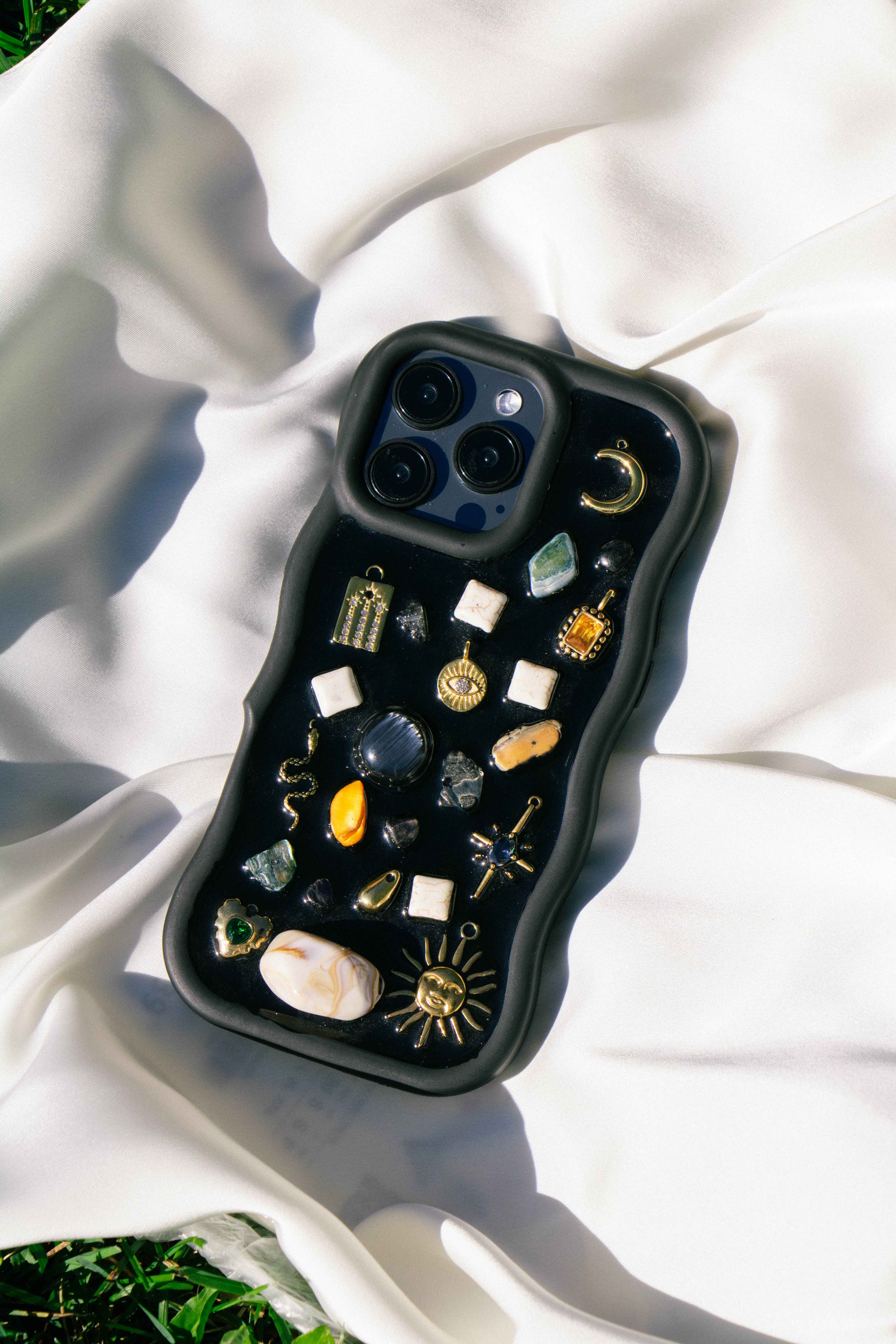 Pre-made Charm Phone Case for iPhone 16 Pro Max – Mystic Dusk featuring handcrafted celestial charms, gemstone-inspired accents, and unique decorative details