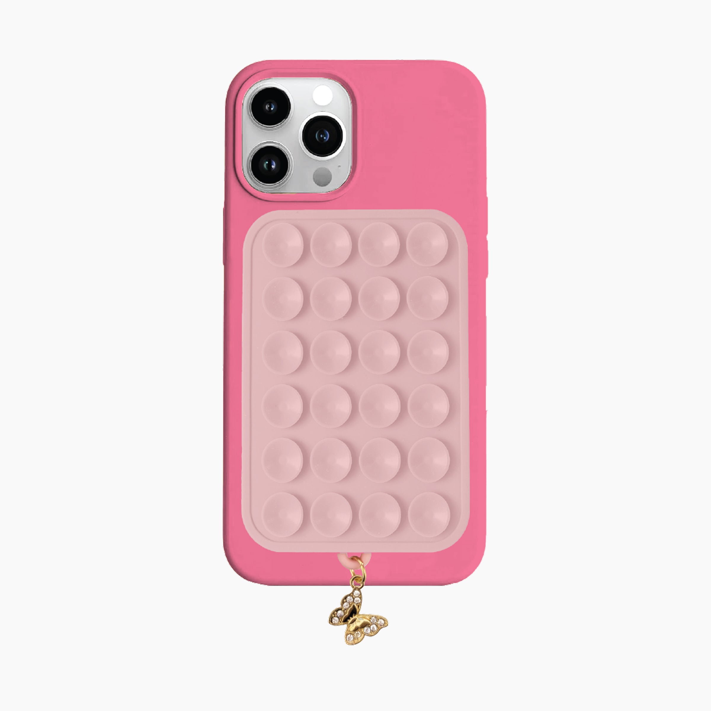 Pink phone case with bubble design and charm on a white background
