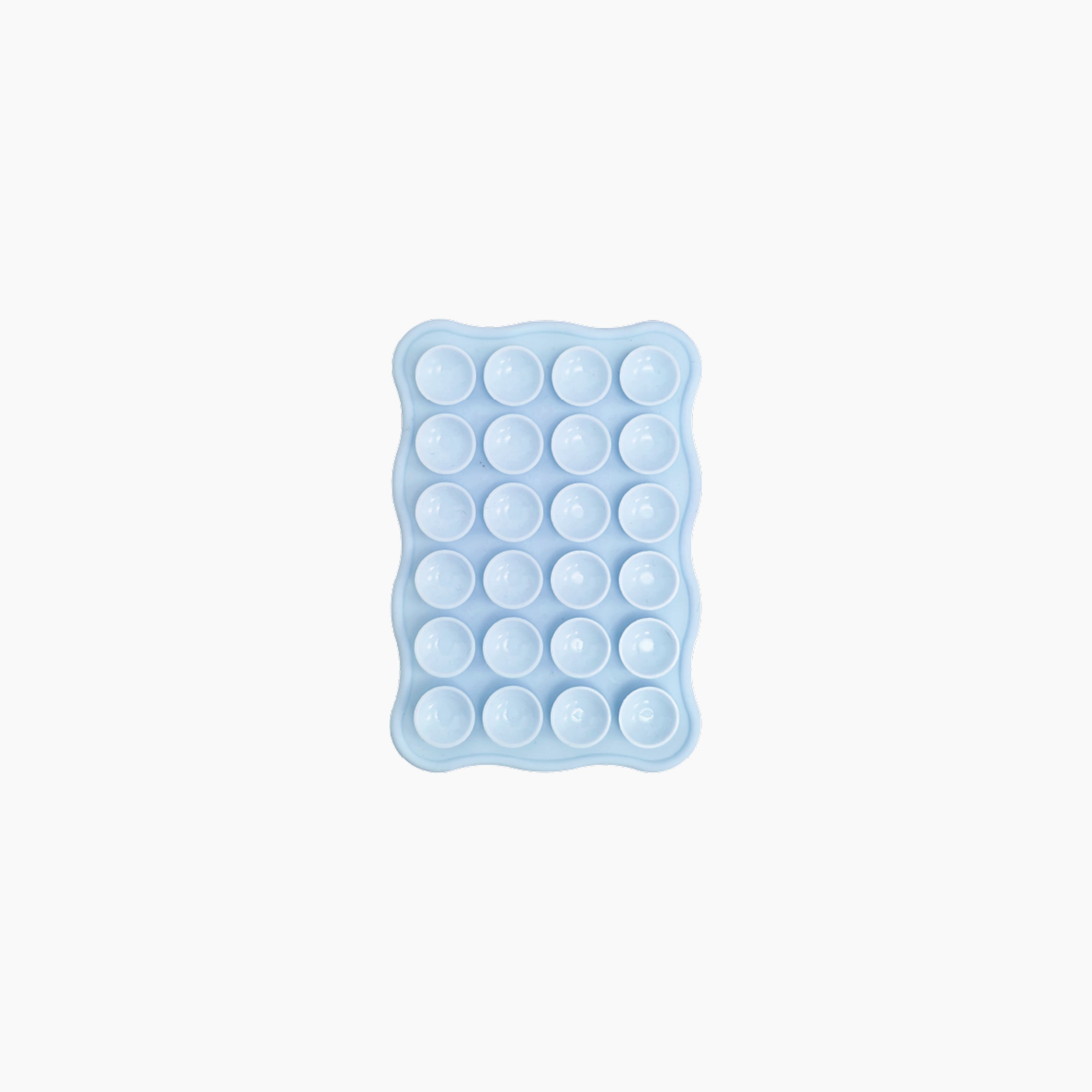 Blue silicone ice cube tray on a white background